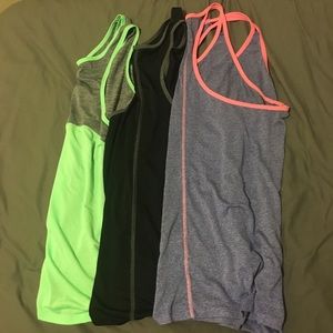 Lot of THREE workout tops GUC racerback